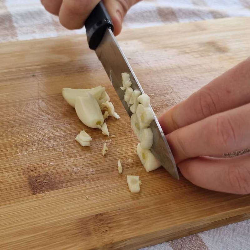 chop garlic cloves