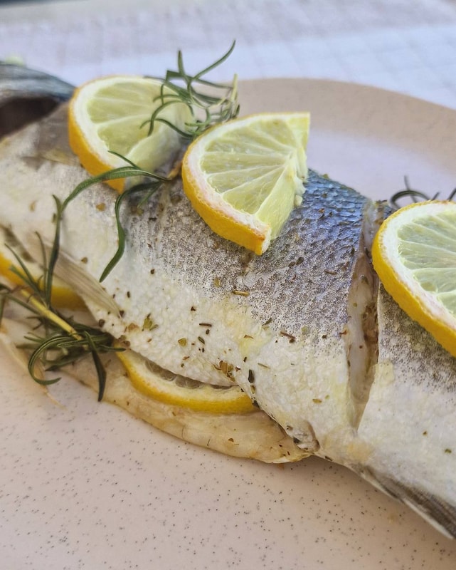 Whole baked sea bass