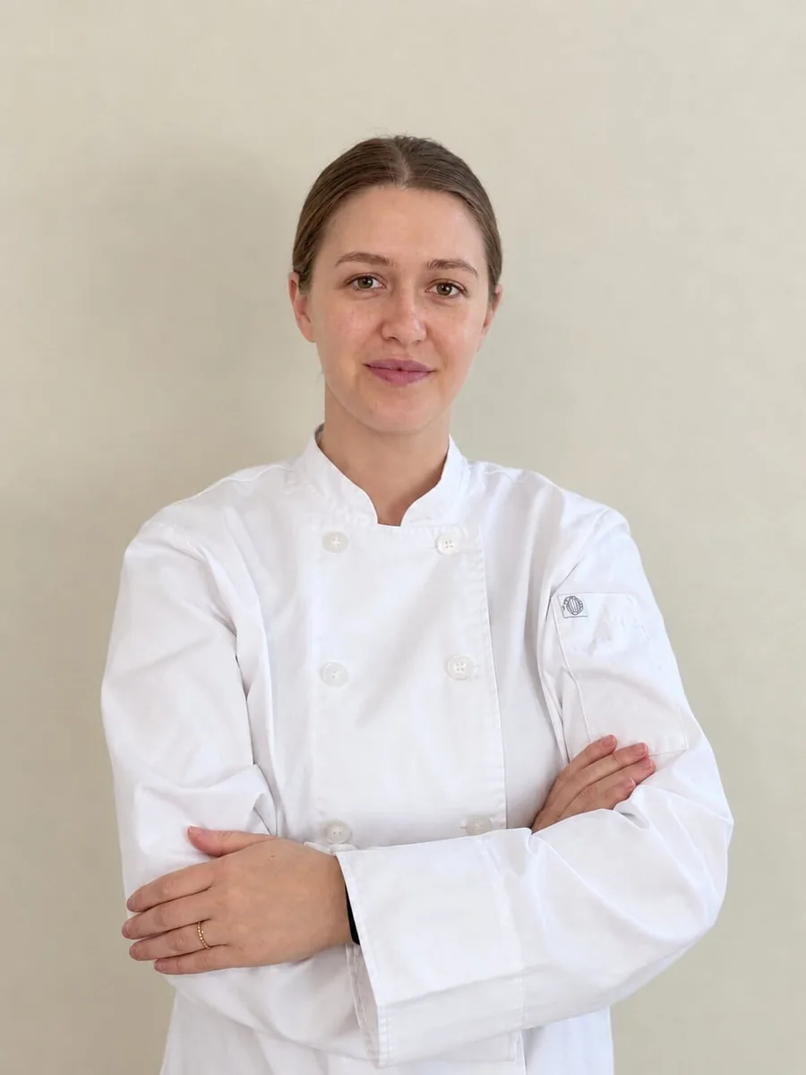Chef Valeriia in a white chef coat