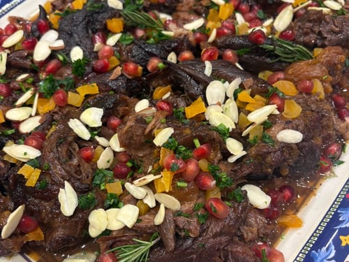 Slow-cooked lamb shoulder with apricots and pomegranate