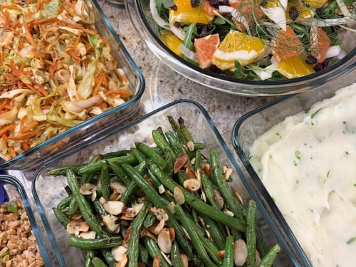 Low-glycemic plate of fish, roasted vegetables and greens
