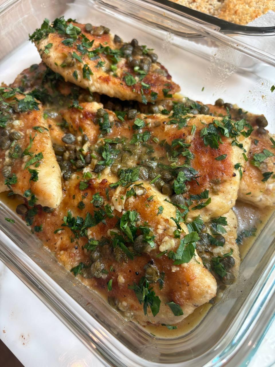 glass dish filled with chicken and mushrooms
