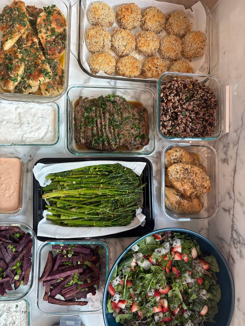 variety of foods are displayed on a table