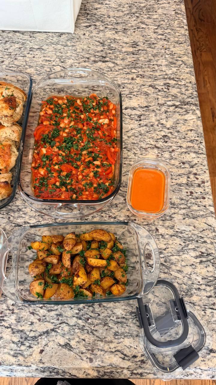 table with a variety of dishes, including a casserole