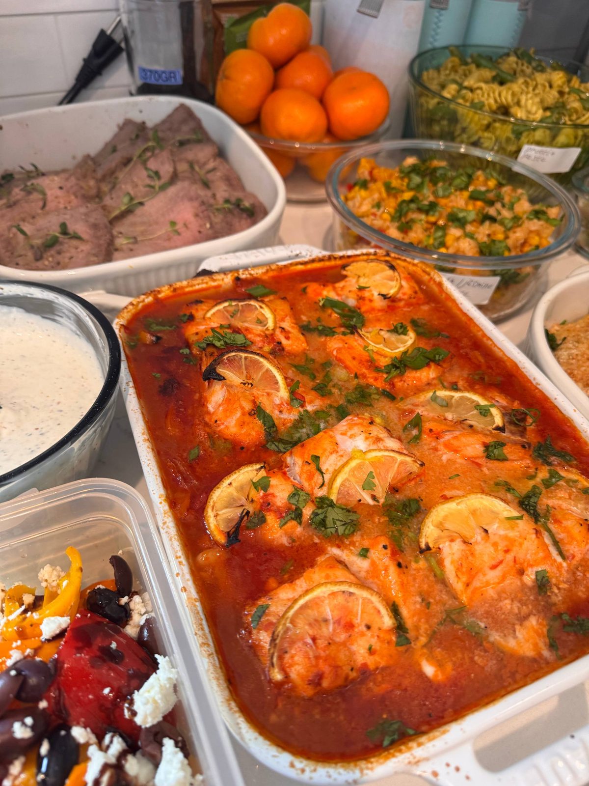 variety of food items are displayed on a table