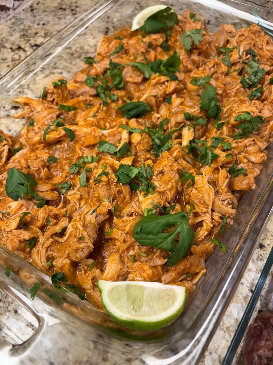 large glass dish filled with a delicious chicken