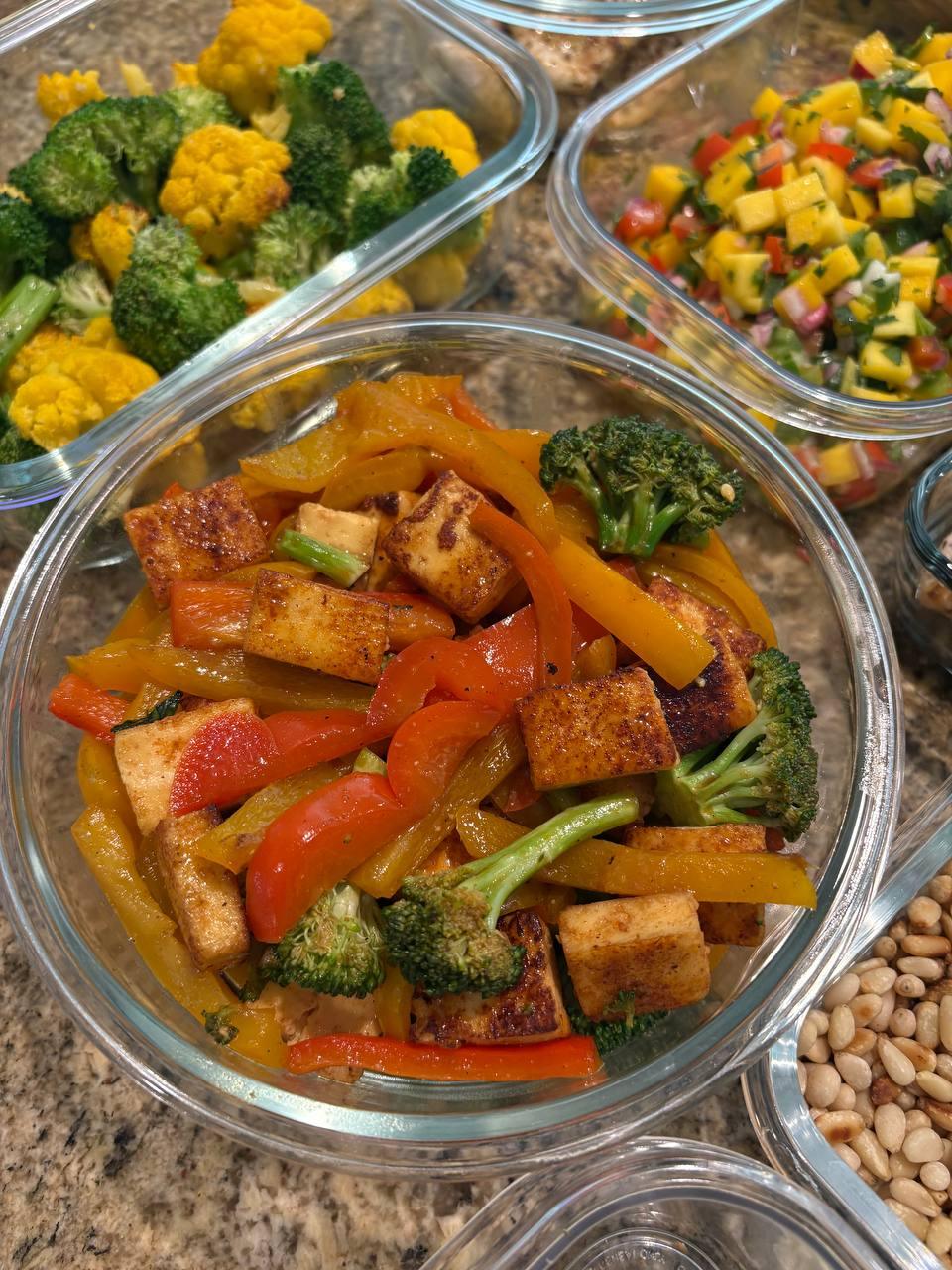 bowl of vegetables, including broccoli and peppers