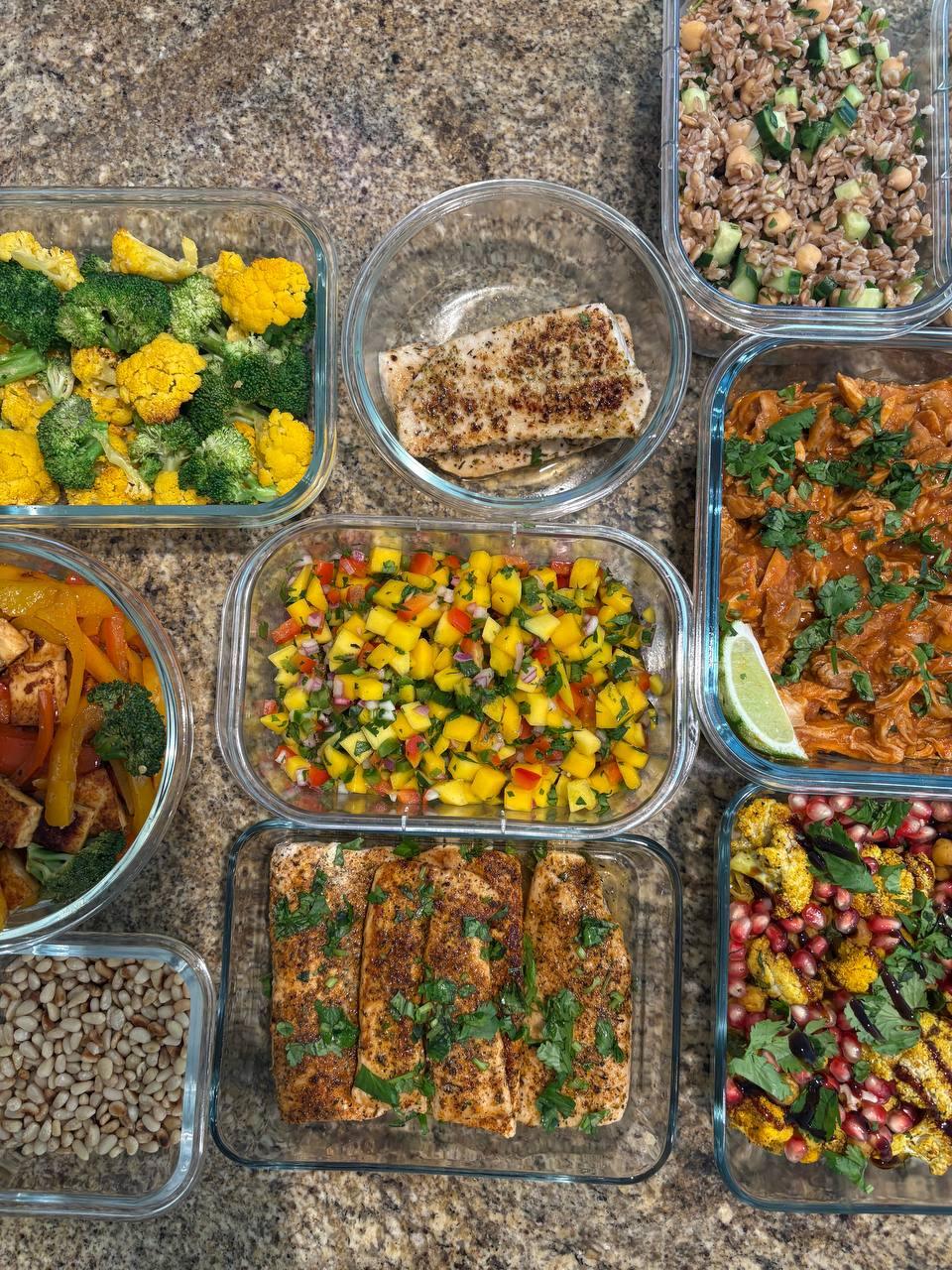 variety of foods are displayed in multiple containers