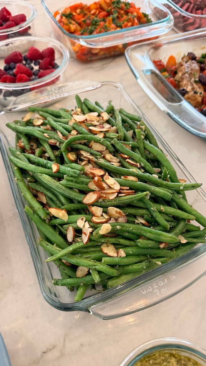 glass dish filled with green beans and almonds