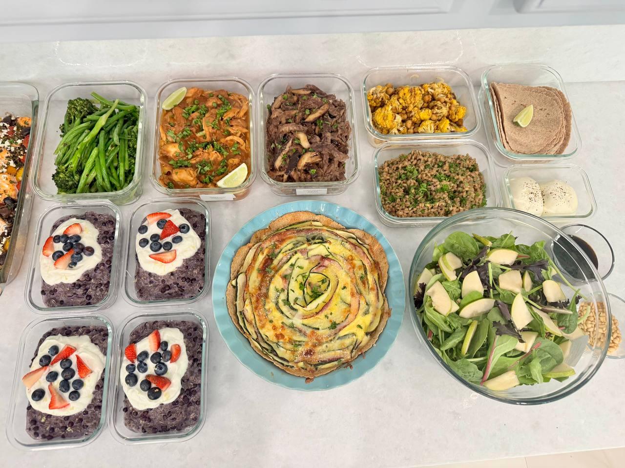 variety of foods are displayed on a table
