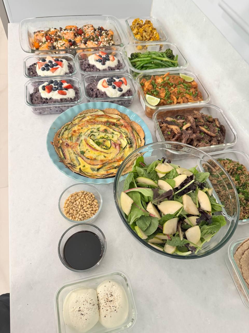 variety of foods are displayed on a table