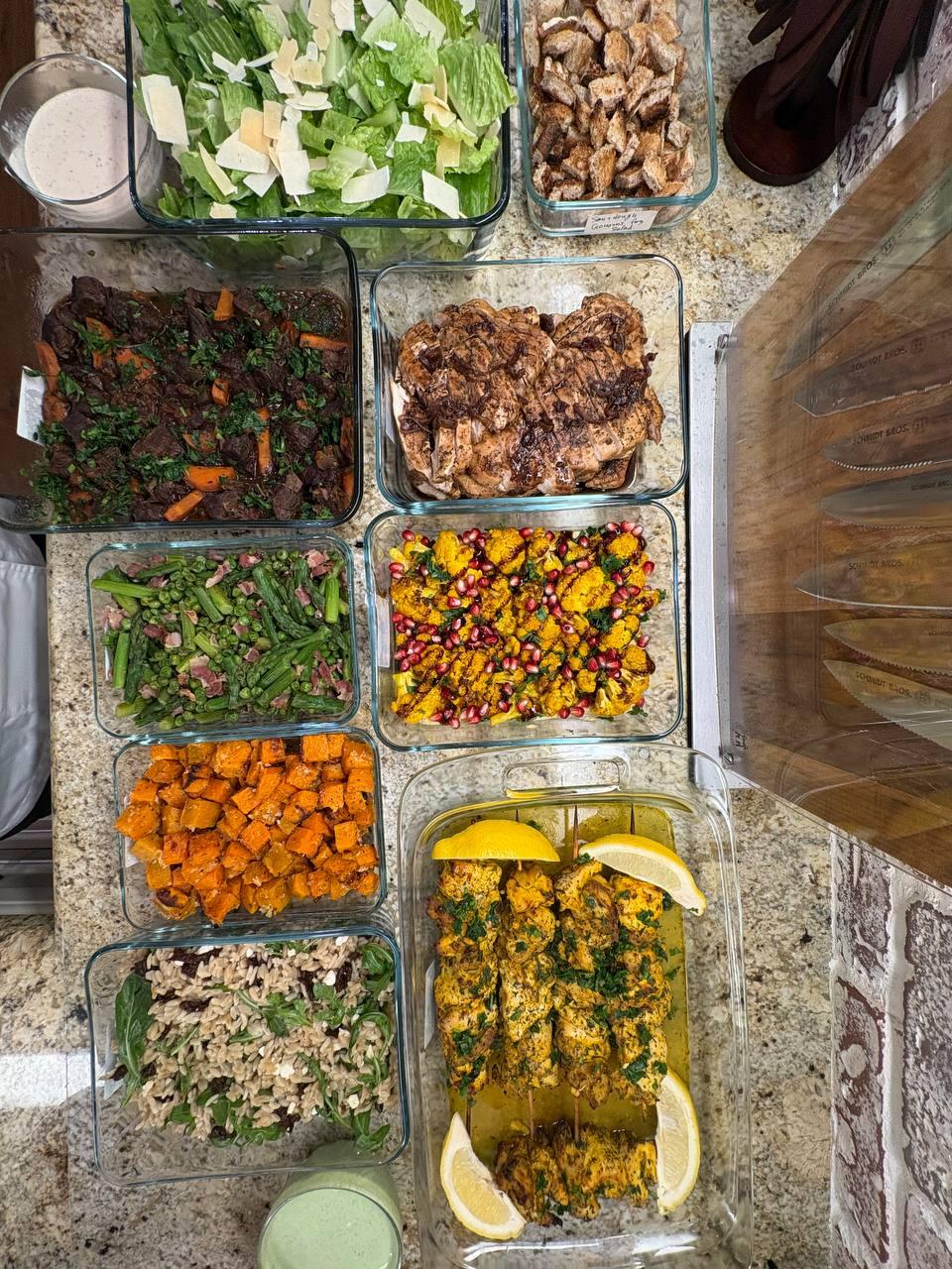 variety of food items are displayed on a counter