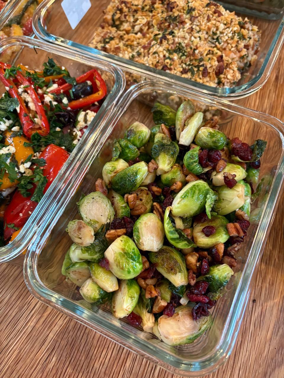 variety of vegetables, including Brussel sprouts and red peppers