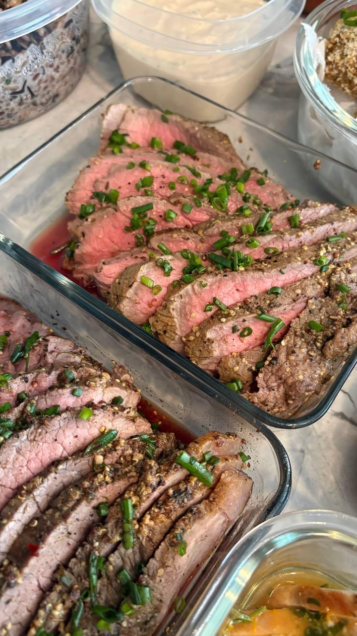 dish of beef with green onions and peppers