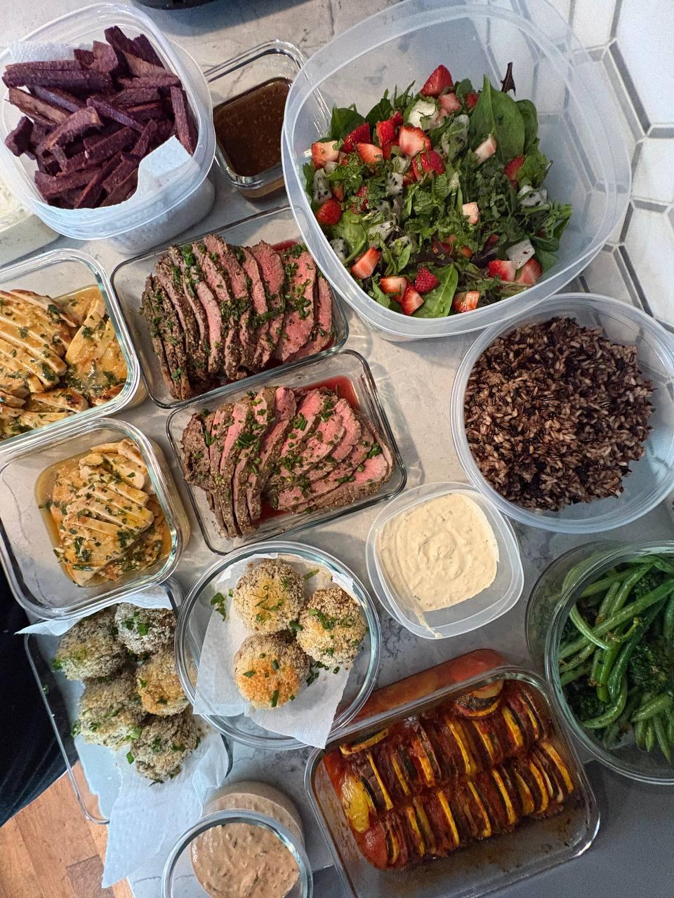 variety of foods including meal prep containers