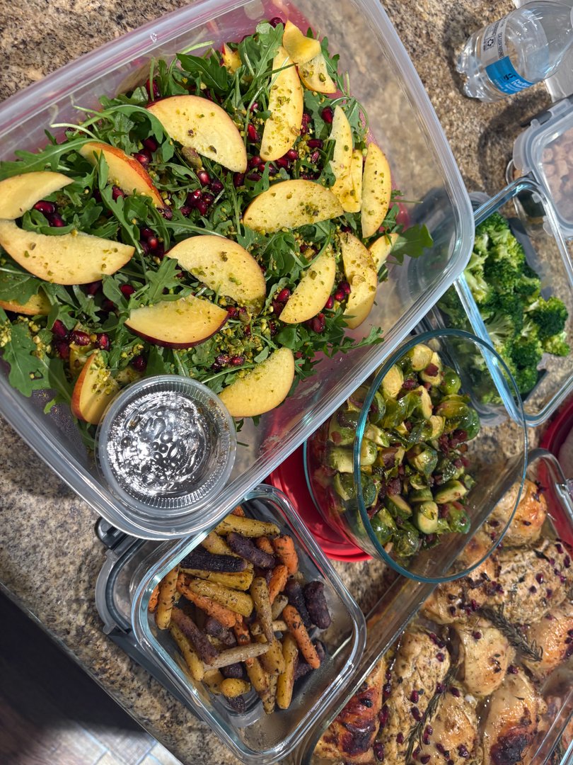 Winter harvest salad with apples, pomegranate, and roasted rainbow carrots.