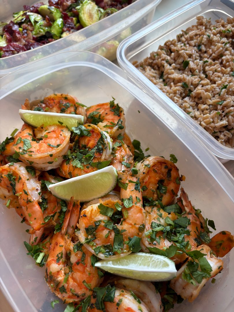 Zesty lime cilantro shrimp with farro in meal prep containers.