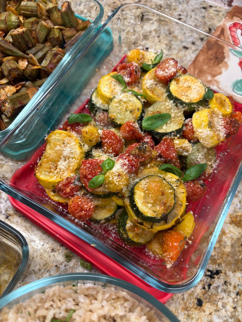 Roasted zucchini, squash, and cherry tomatoes with herbs.